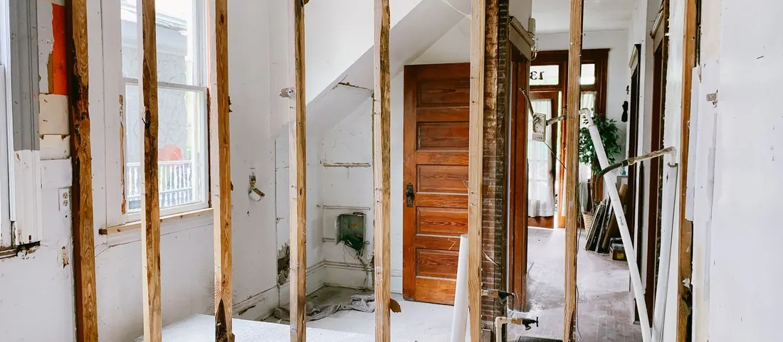 House interior stripped back to bare studs during a renovation